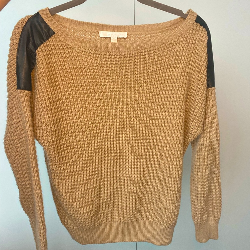 Chic Sweater with faux leather accents!